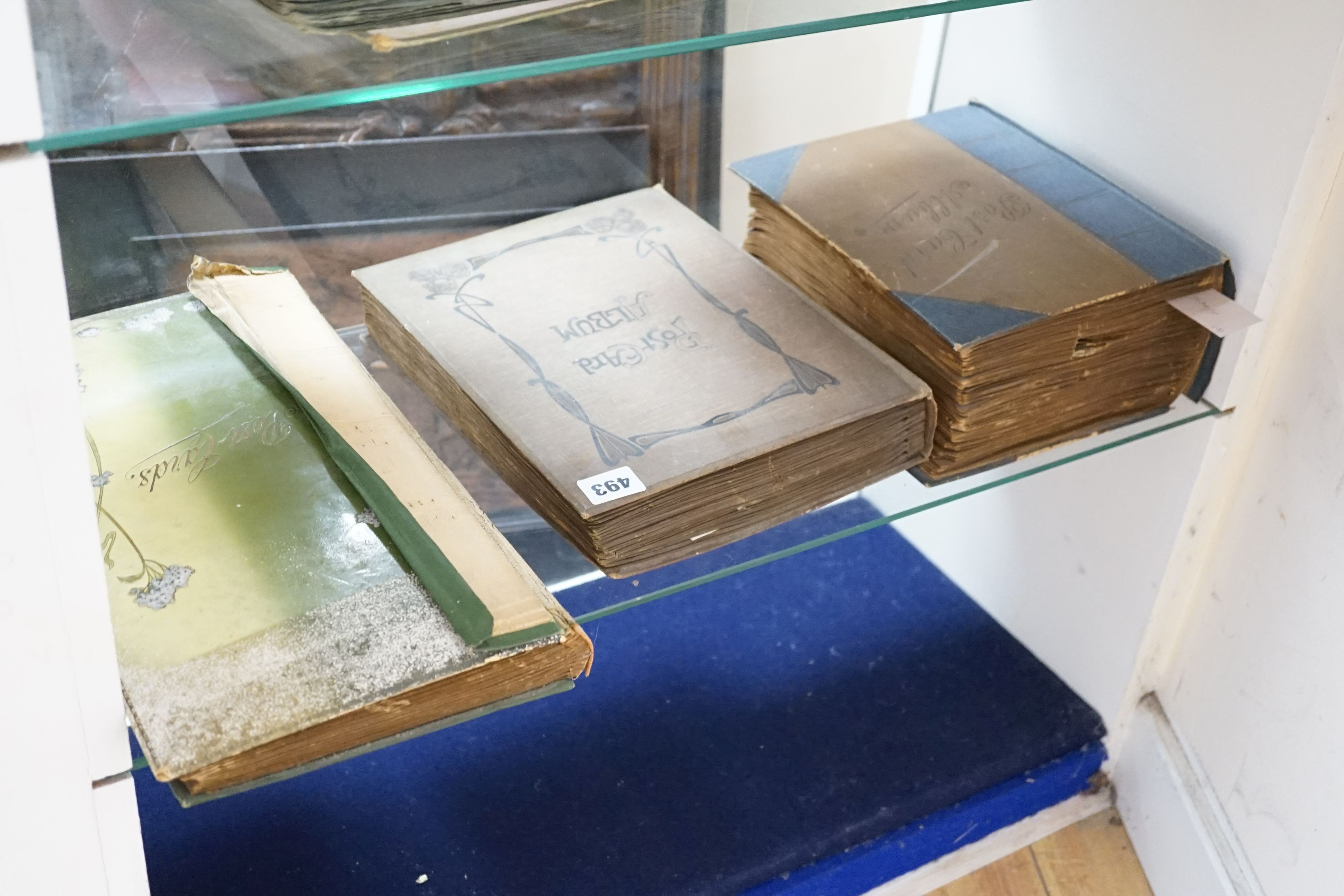Three postcard albums and contents